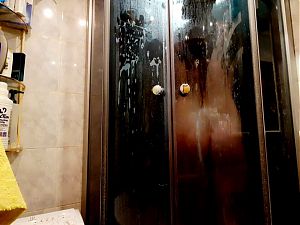 Nude Dominatrix takes a shower. You have a chance to spy on your beloved Mistress taking a shower. 