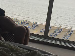 I relax by sucking my hubby properly in front of a window